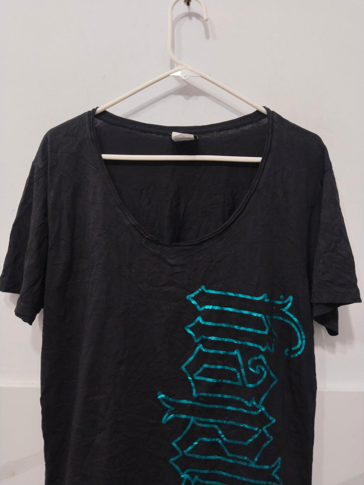 Women's Black Scoop Neck Casual T-Shirt with Vertical Teal Foil/Glitter "Harlem" Print