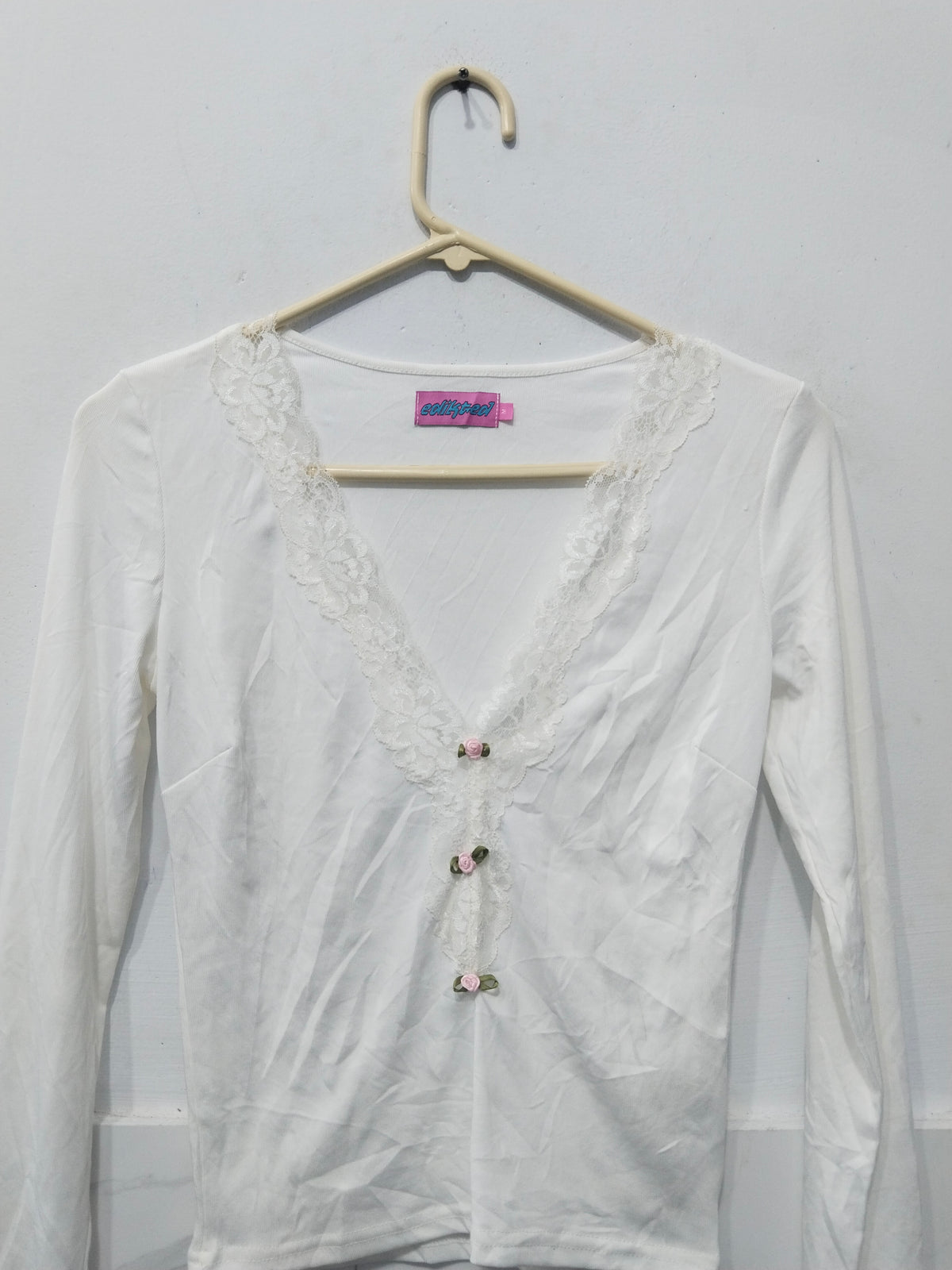 Women's White Long Sleeve V-Neck Top with Lace Trim & Rose Button Accents