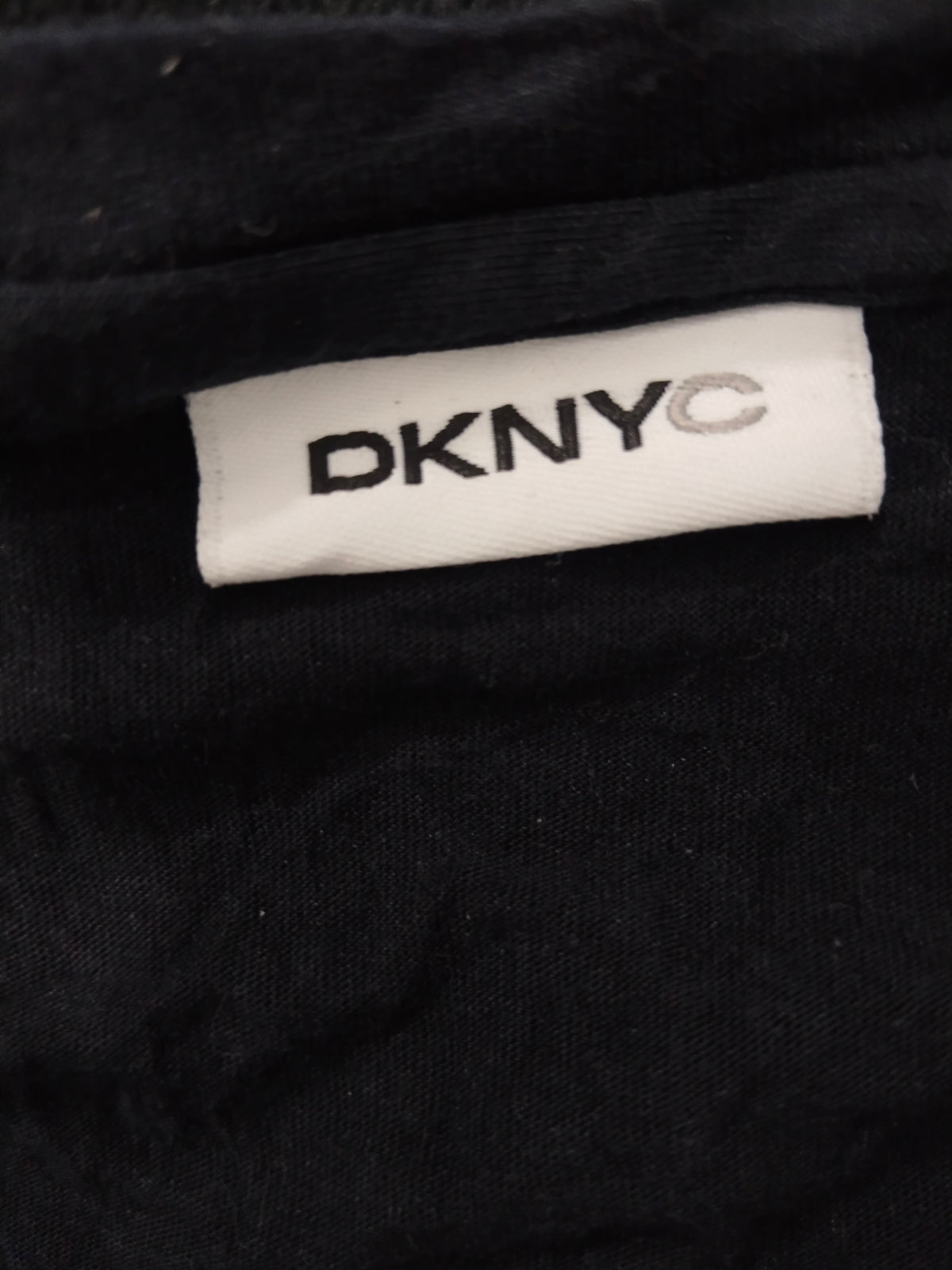 DKNY Women's Black & White Graffiti NYC Skyline Print Long Sleeve Casual Top / Tunic